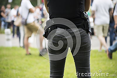 french criminality squad police with shotgun and handcuffs standing in the street Stock Photo