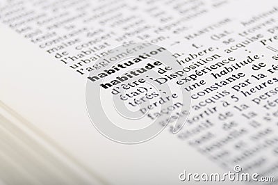 French dictionnary at word Habit Stock Photo