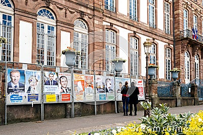 French election day with vintage city hall and all elections pos Editorial Stock Photo