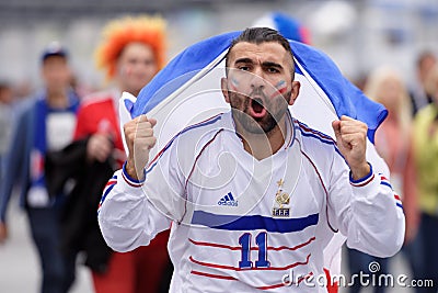 French football fans singing at Saint Petersburg stadium during FIFA World Cup Russia 2018 Editorial Stock Photo