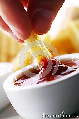 French frie wedge in a sauce Stock Photo
