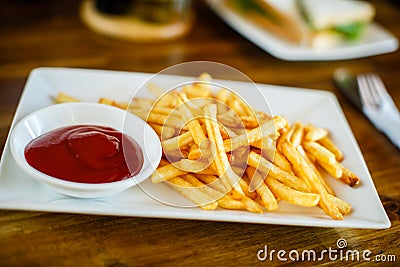 French fried fries with ketchup Stock Photo