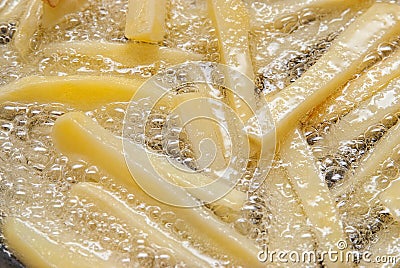 French Fries Frying Stock Photo