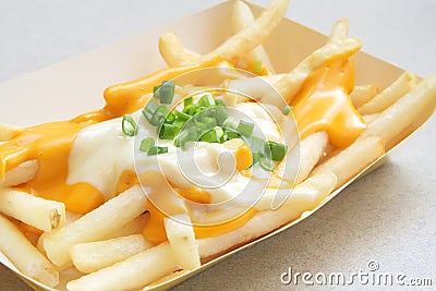 French Fries with Melted Cheese Stock Photo