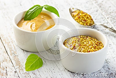 French grain mustard in a bowl. Stock Photo