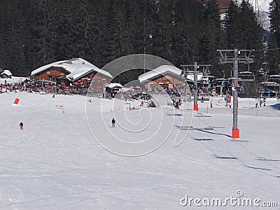 French holiday skiers relax at an outdoor restaurant Editorial Stock Photo