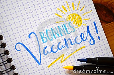 French language BONNES VACANCES! hand-lettered in notebook Stock Photo