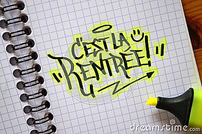 French language C`EST LA RENTREE! hand-lettered in notebook Stock Photo