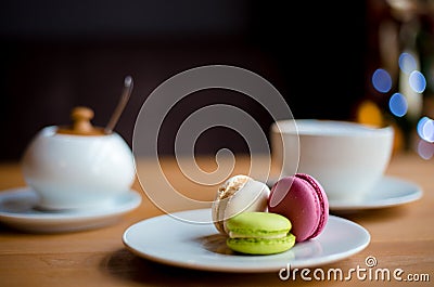 French macaroons on wooden table Stock Photo