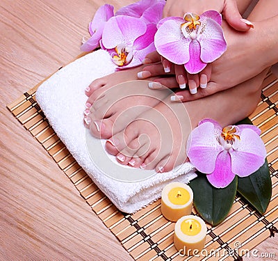 French Manicure on Beautiful Female Feet and Hands Stock Photo