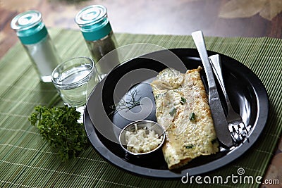 French omelet, French omelette, Beaten eggs fried with butter . Stock Photo
