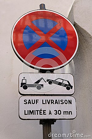 French parking prohibition sign on pain of impoundment Stock Photo