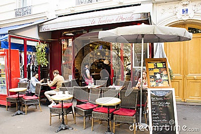 French people and foreigner travelers at restaurant Editorial Stock Photo