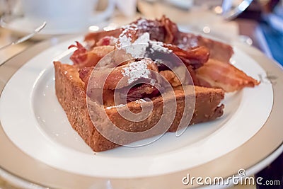 French toast with crispy bacon breakfast brunch dish. Stock Photo