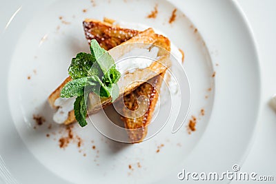 French toast dish made of fried sliced bread soaked in eggs and milk.Cream cheese filling.Soft breakfast recipe.European meal. Stock Photo