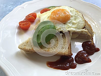 French Toasted Cheese Sandwich with Ham, Fried Egg, Salad Bouquet Stock Photo