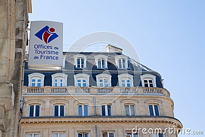 French tourism office sign on a white wall in haussmann street in Bordeaux Paris France Editorial Stock Photo