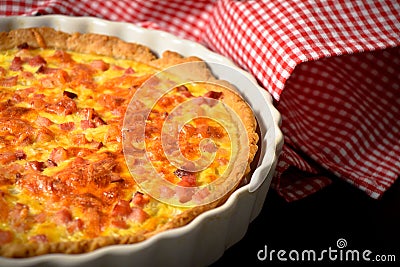 French traditional quiche Lorraine with onion, eggs and bacon Stock Photo