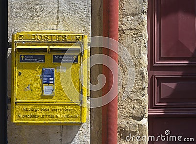 French yellow metal mailboxes. Editorial Stock Photo