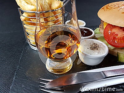 Frenchfries chips whisky glass glencairn singlemalt Stock Photo