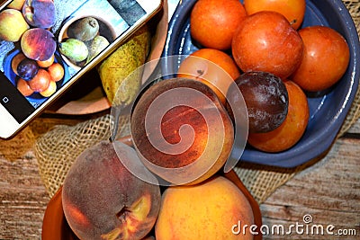 FRESCH FRUIT FOOD ON WOODEN TABLE PEACH KIWI PÃ¹PEAR Stock Photo