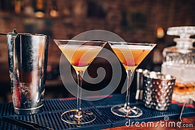 fresh alcoholic cocktails on bar counter. Close up of bar details with beverages and drinks Stock Photo