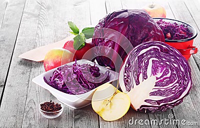 Fresh Apples and Red Cabbage on Wooden table Stock Photo