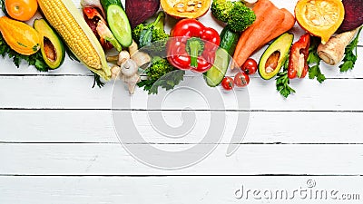 Fresh autumn vegetables on white wooden background. Stock Photo