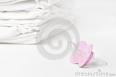 Fresh baby laundry with soother Stock Photo