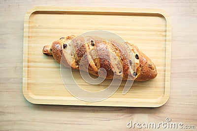 fresh baked brown sugar pillow raisin on table Stock Photo