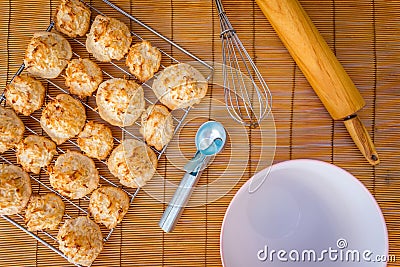 Fresh baked coconut macaroons with seasons greeting tag. Stock Photo