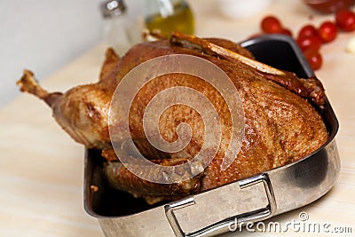 Fresh Baked Goose with potatoes,apple,pepper,olive Stock Photo