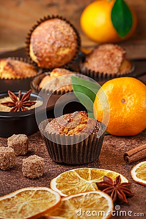 Fresh baked homemade citrus orange, Mandarin cakes muffins with brown sugar, cinnamon and star anise Stock Photo