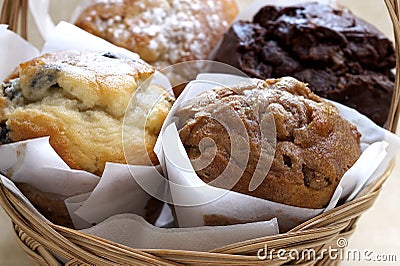 Fresh Baked Muffins In Basket Stock Photo