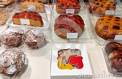 Fresh baked pies and cupcakes in the supermarket Stock Photo