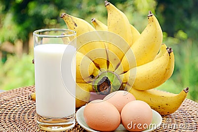 Fresh Bananas, Milk and Eggs. Stock Photo