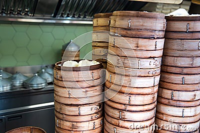 Fresh baozi in bamboo steamer on Chinese food street Stock Photo