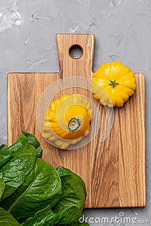 Vegetables on a wooden board ready to cook Stock Photo