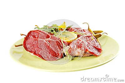 Fresh beef medallion on green Stock Photo