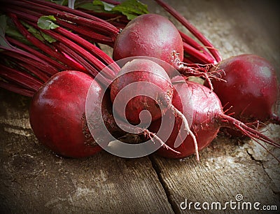 Fresh beetroot on rustic wooden background. Harvest vegetable cooking conception . Diet or vegetarian food concept Stock Photo