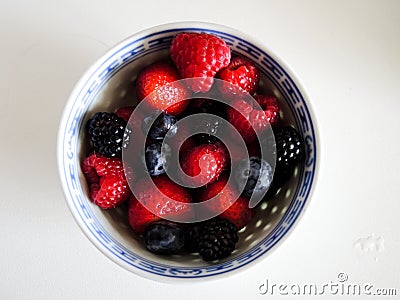 Fresh berries. Various summer berries in a bowl Stock Photo