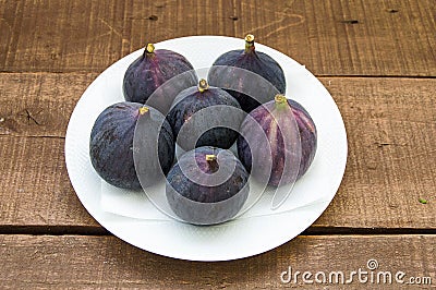 Fresh black figs age paintings, fresh fig fruit in dish, Stock Photo