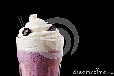 Fresh blackberry milkshake close-up Stock Photo