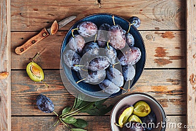 Freshly picked plums in a bowl Stock Photo