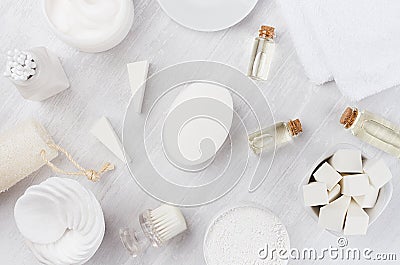 Fresh body and skin care spa cosmetics collection and natural bath accessories on white wood background, top view. Stock Photo