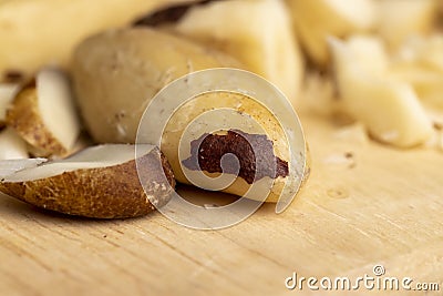 Fresh Brazil nuts peeled from the shell on the table Stock Photo