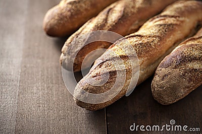 Fresh bread baguette with topped with polenta Stock Photo