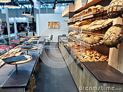 Fresh bread and pastries in bakery Stock Photo