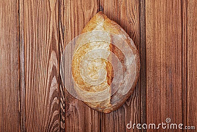 Fresh bread on a wooden table Stock Photo