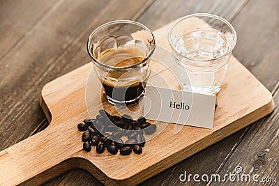 Fresh brewed black Espresso coffee and water Stock Photo